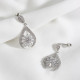 Gümüş Renk Zircon Taşlı Oval Abiye Küpe Gümüş Renk Zircon Taşlı Oval Abiye Küpe