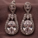Zircon Taşlı Sallantılı Gümüş Renk Abiye Küpe