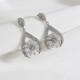 Gümüş Renk Zircon Taşlı Oval Abiye Küpe Gümüş Renk Zircon Taşlı Oval Abiye Küpe