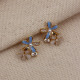 Zircon Taşlı Gold Renk Çiçek Figür Vip Küpe Zircon Taşlı Gold Renk Çiçek Figür Vip Küpe
