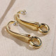 Kare Taş Detaylı Gold Renk Vintage Küpe Kare Taş Detaylı Gold Renk Vintage Küpe